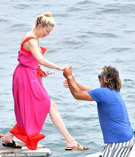 amber heard bikini photos|Amber Heard dons a tiny red bikini on a yacht in the Amalfi Coast